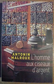 L'homme aux ciseaux d'argent